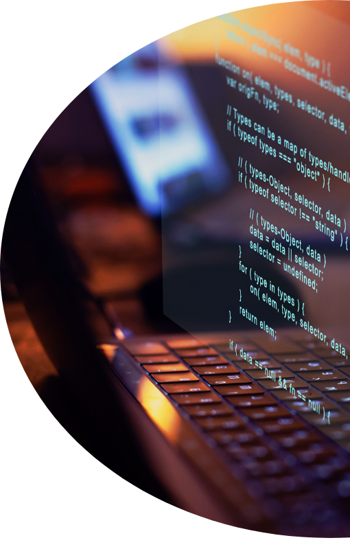 Web developer working on laptop code
